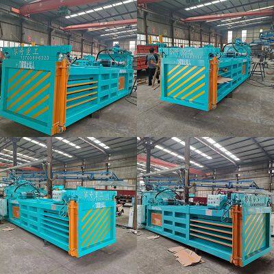 Вертикальный гидравлический упаковщик для отходов из картона. Вертикальный упаковщик для текстильных материалов. Гидравлический упаковщик для центров переработки