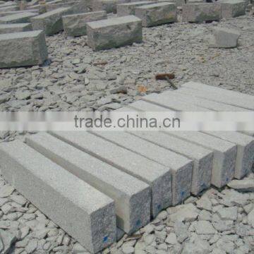 road kerb in artificial granite paving stone