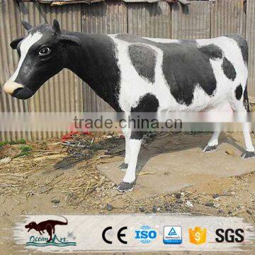 Animated fiberglass life size cow