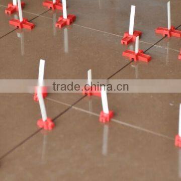 tile leveling system, tile leveling spacer, tile lippage system