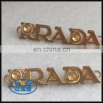 cangnan custom made cheap aluminum metal clothing badge/tag
