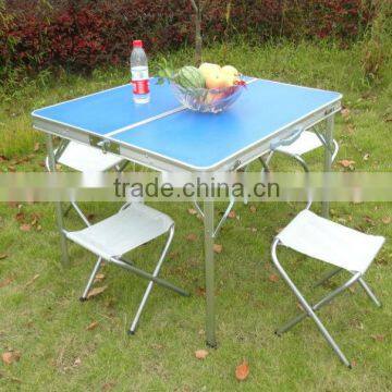 Aluminum folding picnic table with 4 chairs - both used in door and outdoor