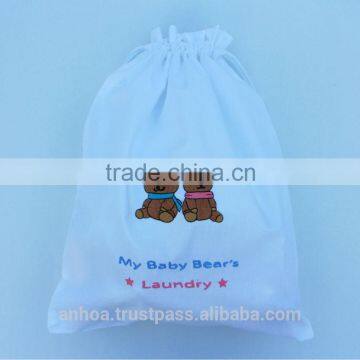 Embroidered drawstring laundry bags with teddy bears