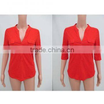 Young lady's tab-sleeve split-neck pocket top