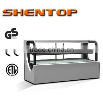 Shentop STPA-R15V Curved Glass Refrigerated Bakery Case with Marble Bakery Display Case