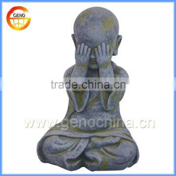 Sitting monk figurine