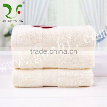 plush 100% cotton solid color banded satin face towel