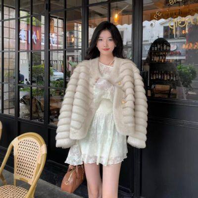 A short faux mink fur coat, a young and eco-friendly European mink fur coat for women in autumn and winter