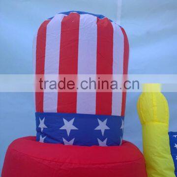 PATRIOTIC INFLATABLE 6' UNCLE SAM HOLDING AMERICAN FLAG WITH BALD EAGLE