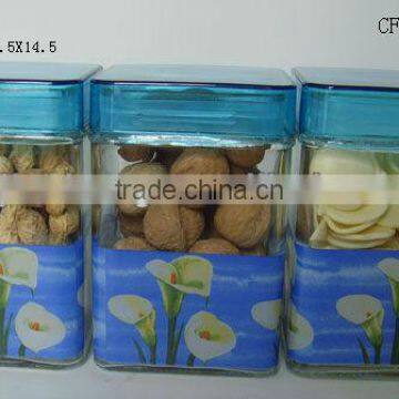 square blue plastic lid glass cookie jar