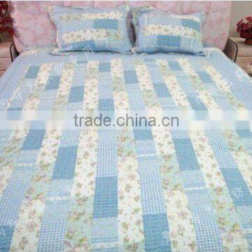 blue patchwork quilt