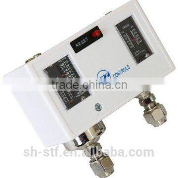 Pressure controller with manual reset