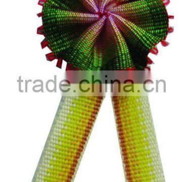 Cross ribbon with a colorful flower