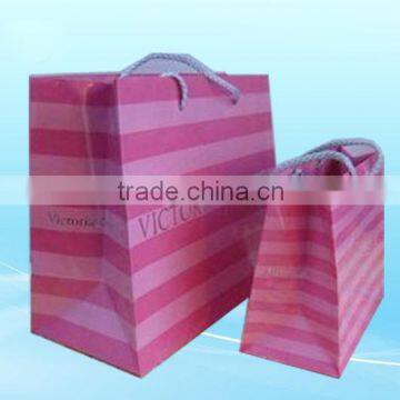 Pink craft paper bag with handles