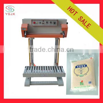 strong load capacity pneumatic stand up feed bag heat sealing machine