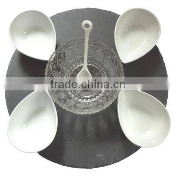 white porcelain plate with slate appetizer set