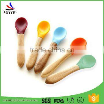 China supply FDA food grade heat resistant safe Eco-friendly baby silicone spoon with wooden