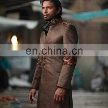 Latest Designer Sherwani for groom/self embossed with crystal work 2016