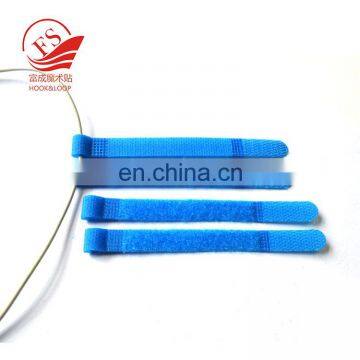 Self-adhesive hook and look cable tie