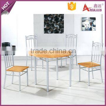 Foshan dining room furniture particleboard restaurant wooden round dining tables with 4 chairs