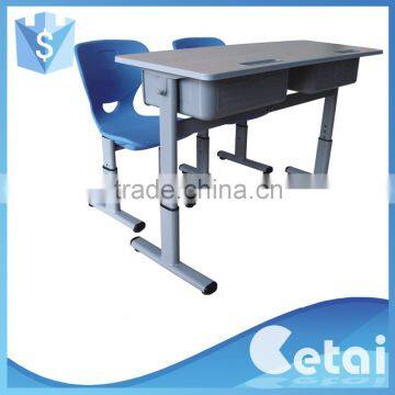 Double wooden school desk and chair