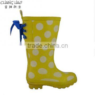 Rubber rain boot women fashion boot has yellow ground has white circle with bule bow