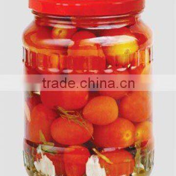 Pickled cherry tomato in glass jar