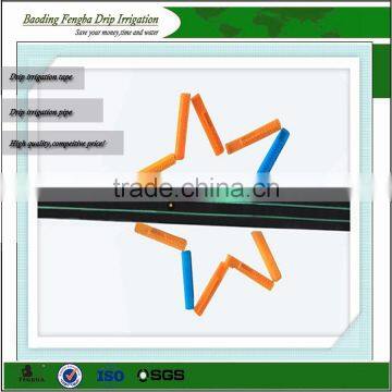 Drip tape with flat emitter irrigation drip tape system