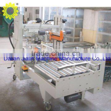 Carton corner sealing machine