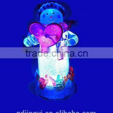 Holding a Red Heart Acrylic Snowman With LED Light photo-2