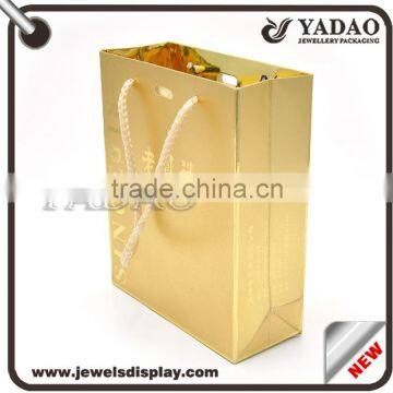 Free shipping cost cheap price fancy glossy paper with polypropylene handles