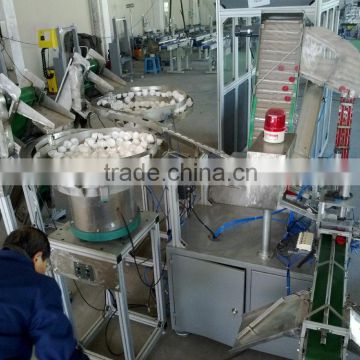 Automatic cap assembly machine