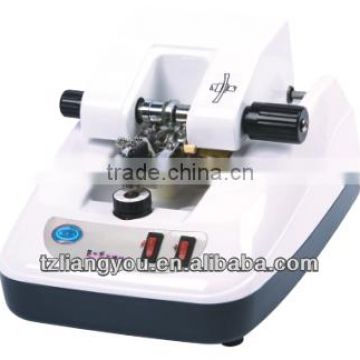 OPTICAL LENS GROOVING MACHINE