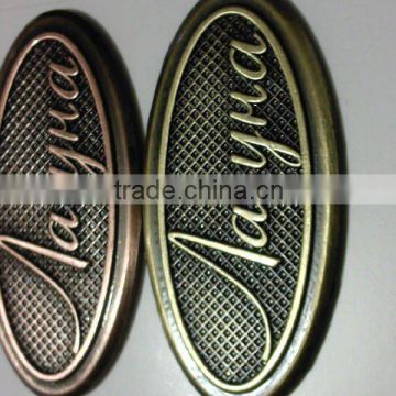 Zinc alloy furniture nameplate.