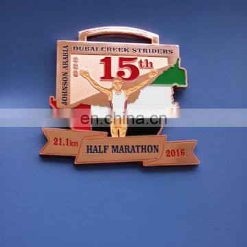 custom shape half marathon medallion for dubai creek striders