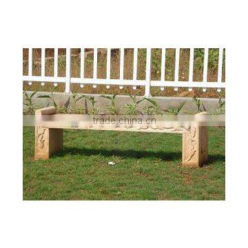 small carved sandstone bench