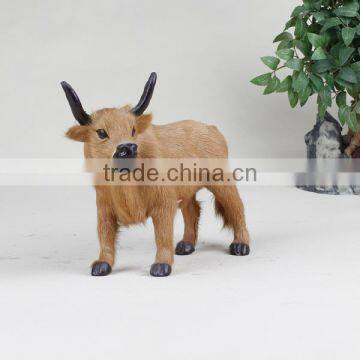 new designed artificial cartoon cow with horn