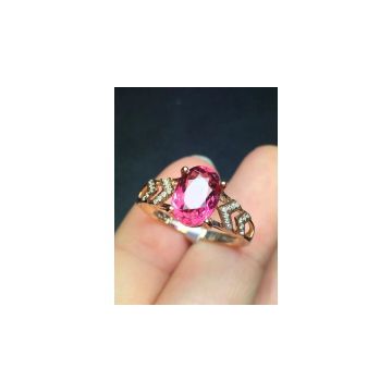 Classical natural pink tourmalines 18k gold ring set with diamonds.