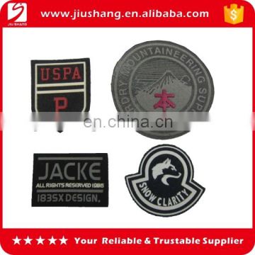 Custom fabric woven labels with rubber embossed logo for clothing