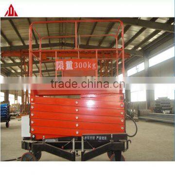 6m 300kg Excellent Quality Four Wheel Mobile Scissor Lift Platform photo-6