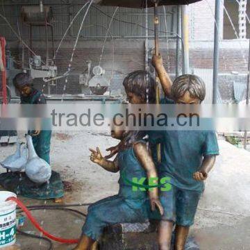 Bronze children with umbrella fountain sculpture