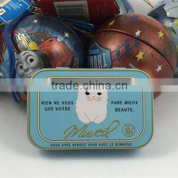 small metal hair wax box with pretty design