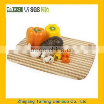 NEW FACTORY SEALED STRIPED BAMBOO CUTTING BOARD