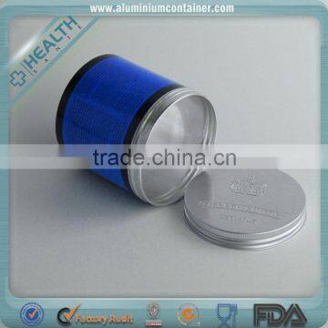 Round little metal cans with lids