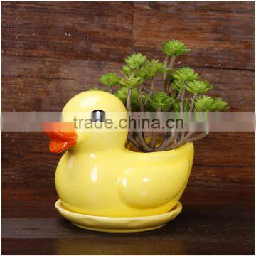 Little yellow duck animal shape ceramic flower pot for garden decor                        
                                                                                Supplier's Choice