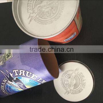 Labeling paper cardboard tubes with metal tin lids