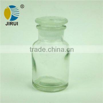 clear glass reagent bottle