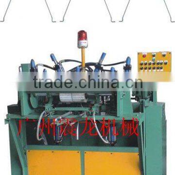 Drying racks hook machine