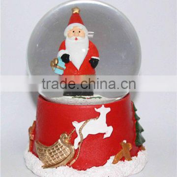 Resin Christmas lighted snow globe