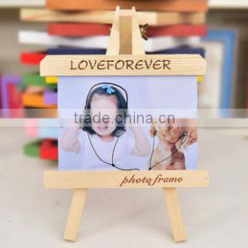 Unique mini easel shape customized wooden photo frames with laser logo on table